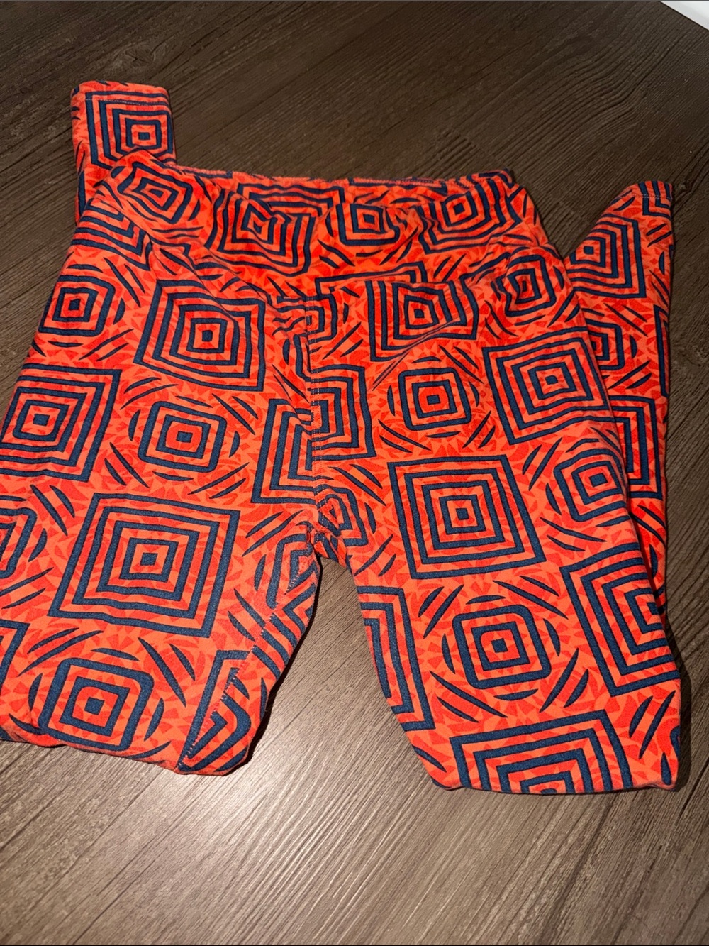 LuLaRoe Orange and Navy Geometric Print Leggings